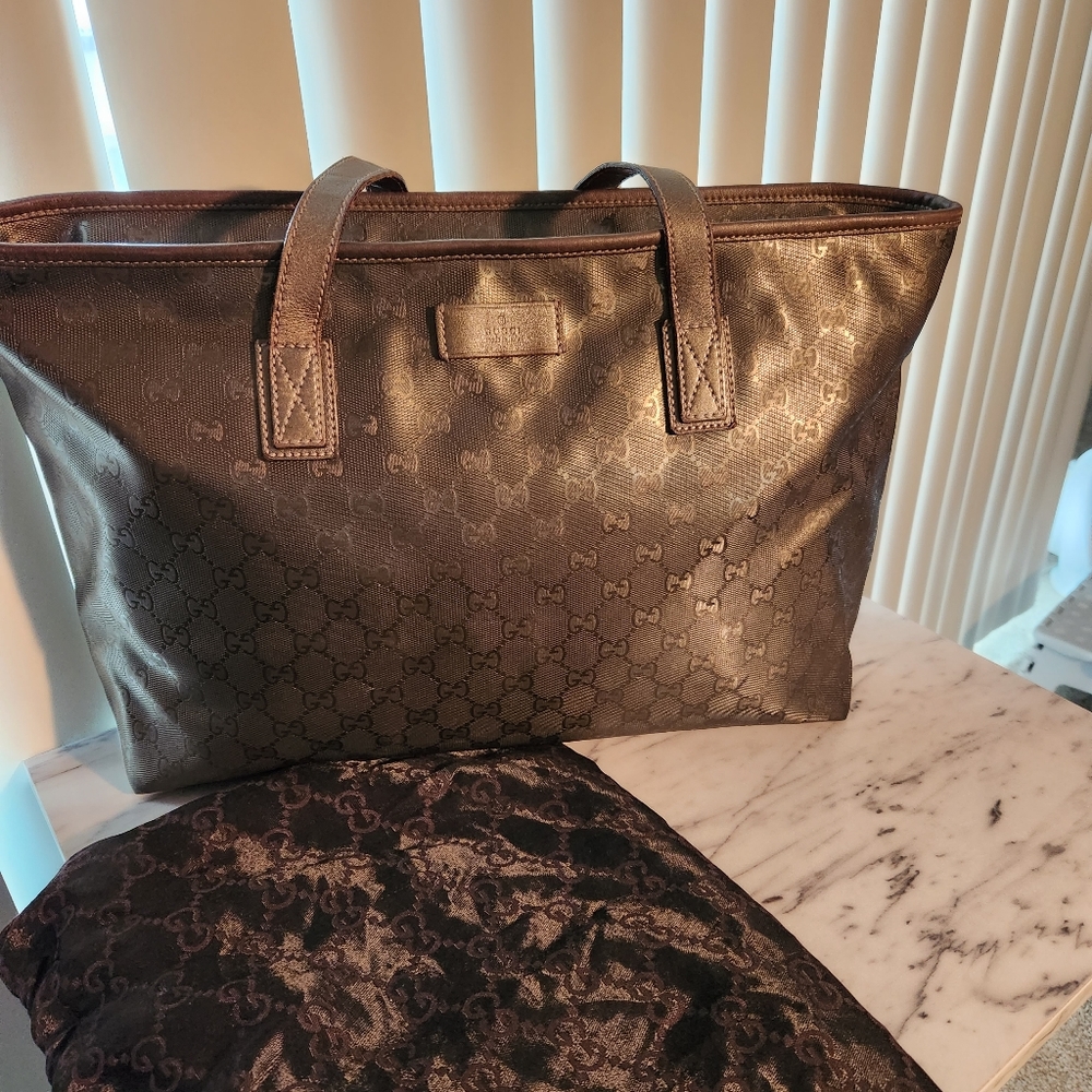 Authentic Gucci gold monogram coated Imprime canvas tote bag